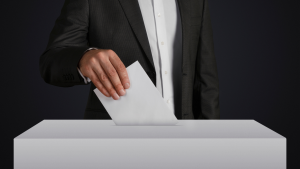 Man submitting ballot